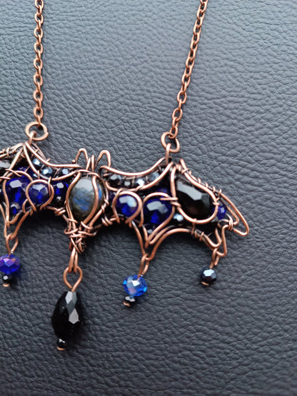 Midnight whisper. Bat necklace.