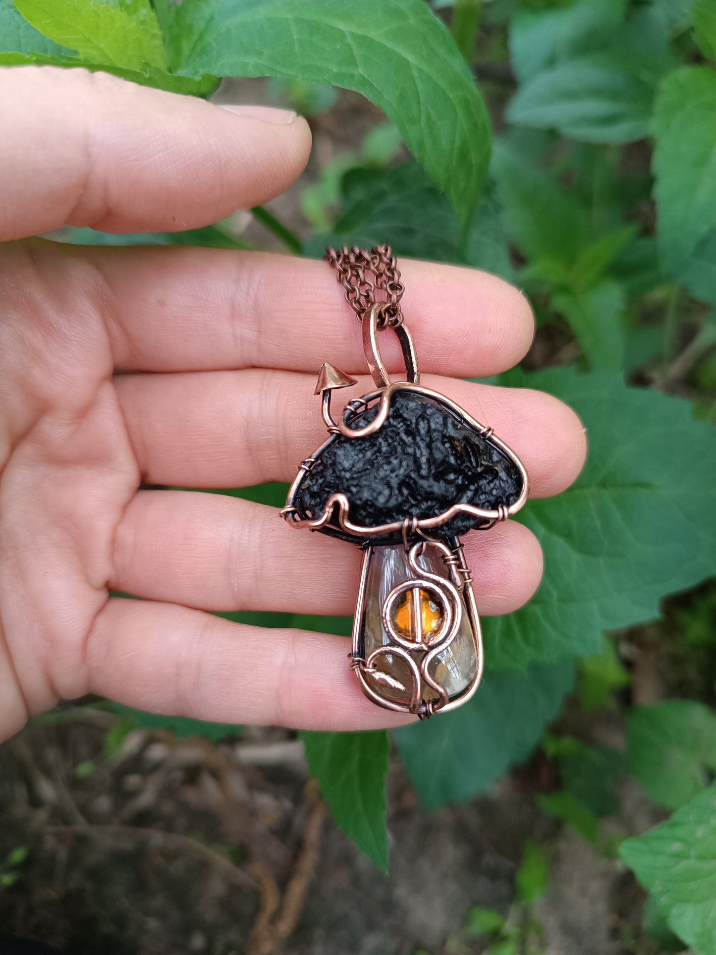 Mushroom fairy house pendant.