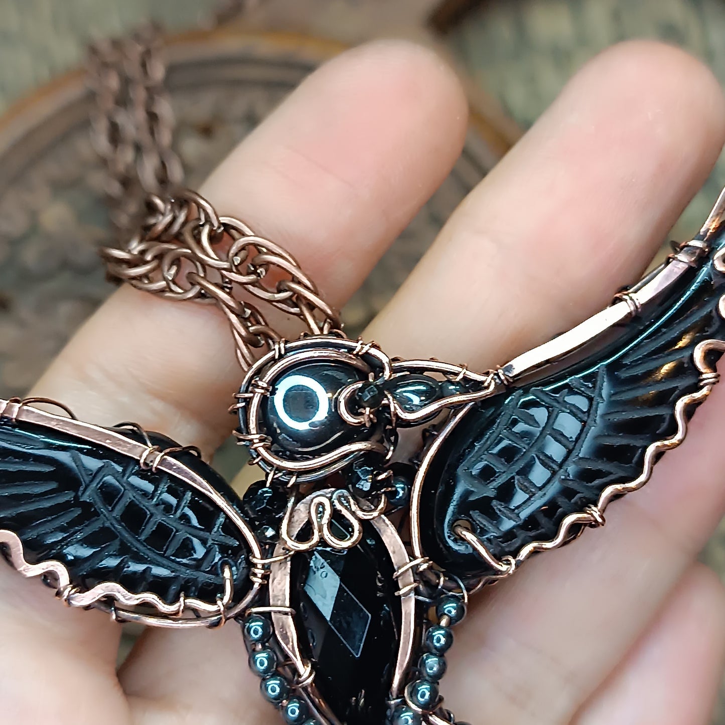 Secret keeper. Raven necklace with open wings.