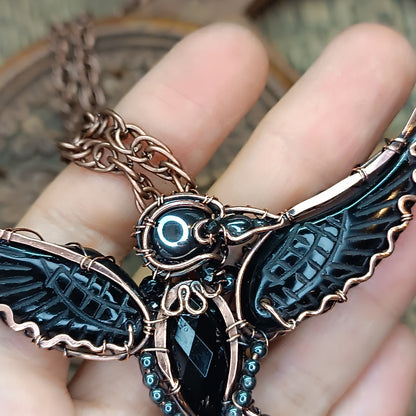 Secret keeper. Raven necklace with open wings.