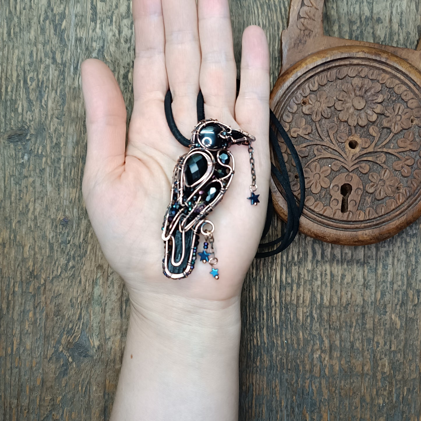 Stars keeper. Black raven necklace.
