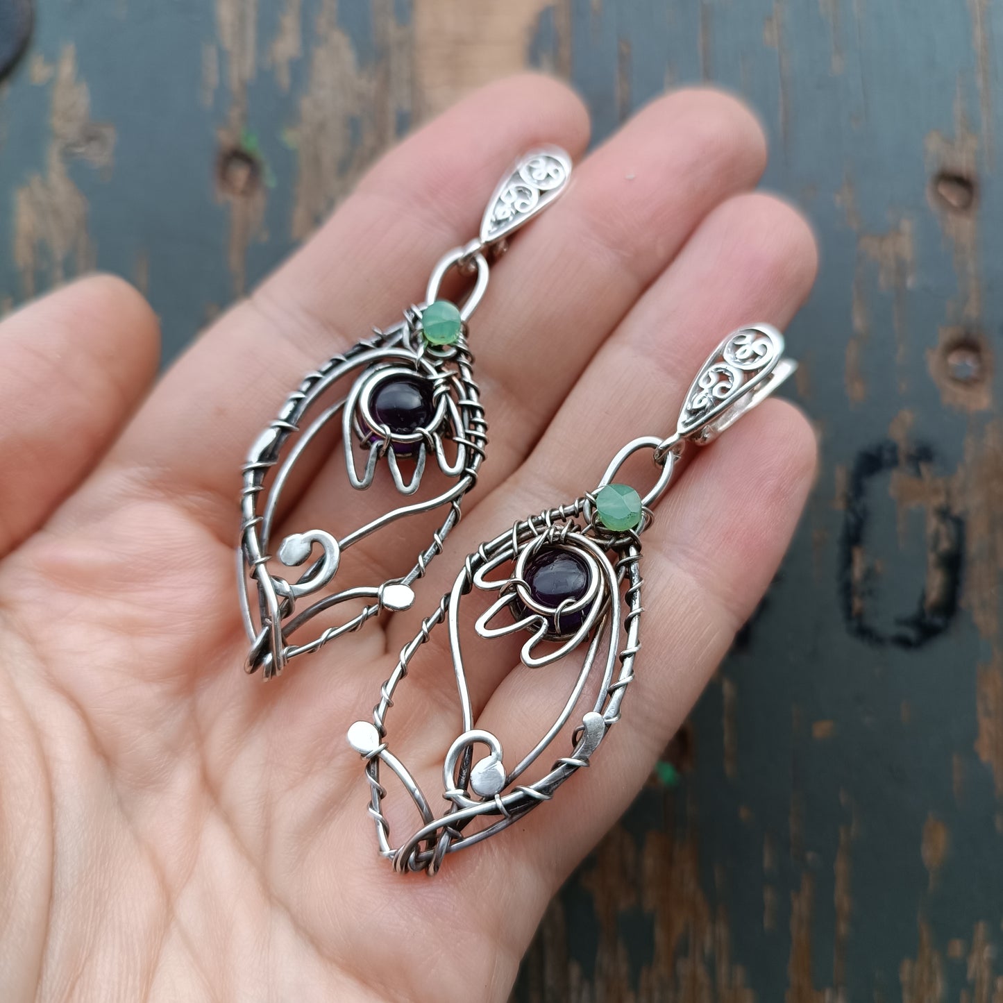 Silver dangling earrings. Amethyst bells.