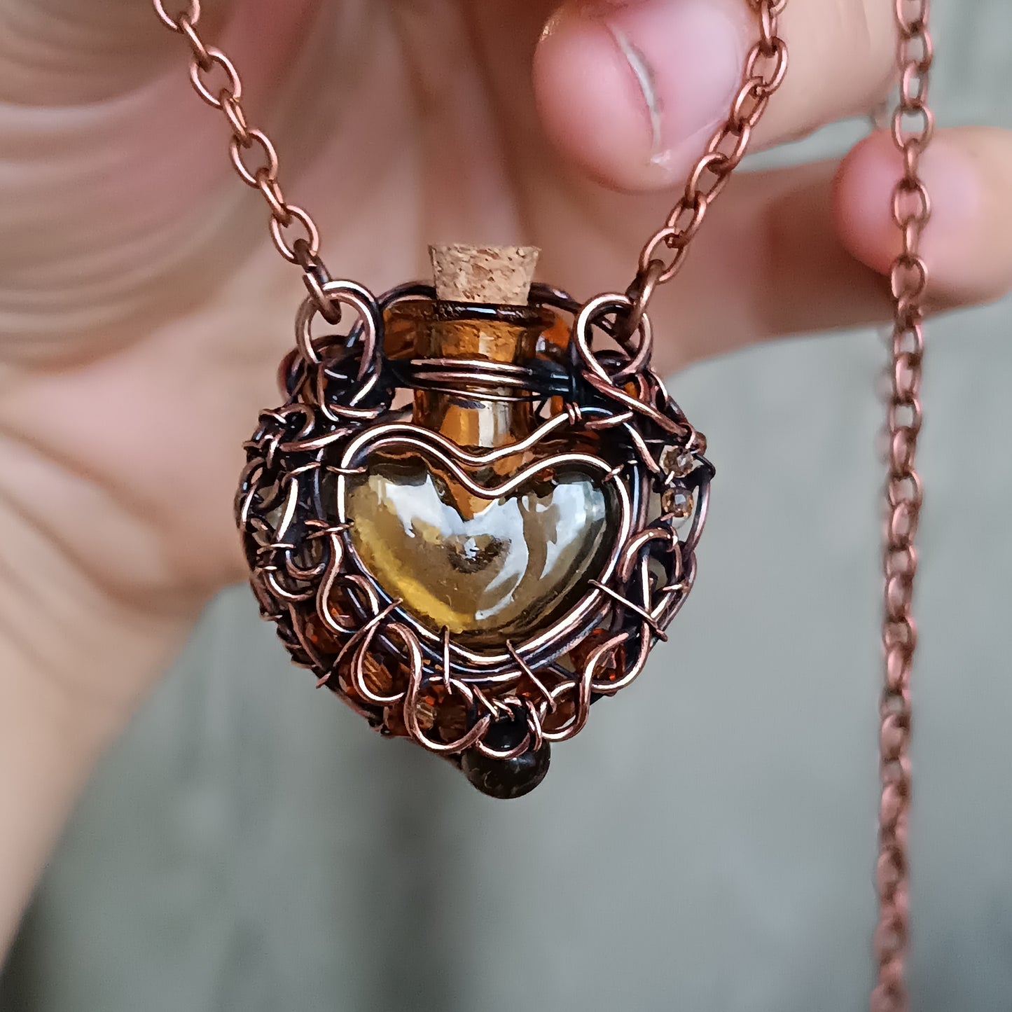 For Susan. Paw vial pendant