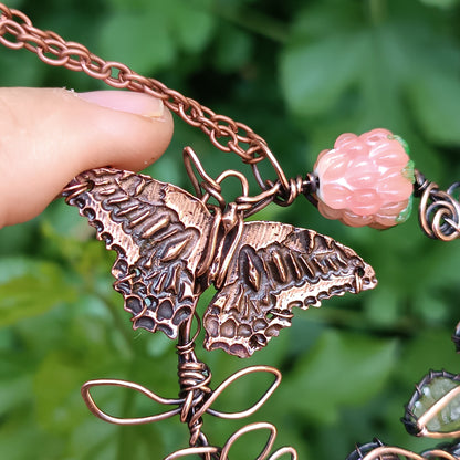 Life circle. Pink raspberry butterfly necklace