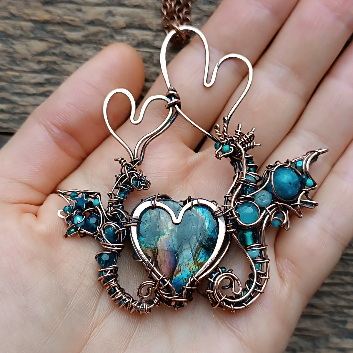 "Love you!" Dragons necklace.