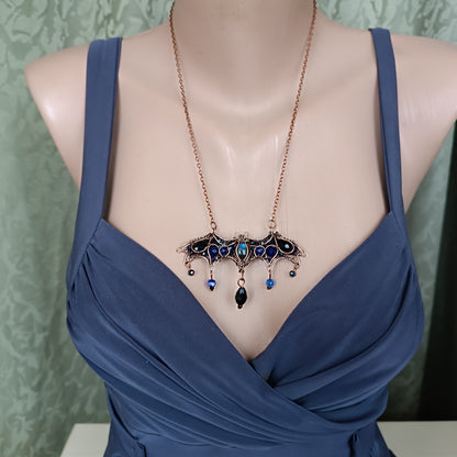 Midnight whisper. Bat necklace.