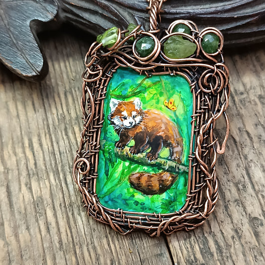 Red panda and a butterfly necklace. Reversible.