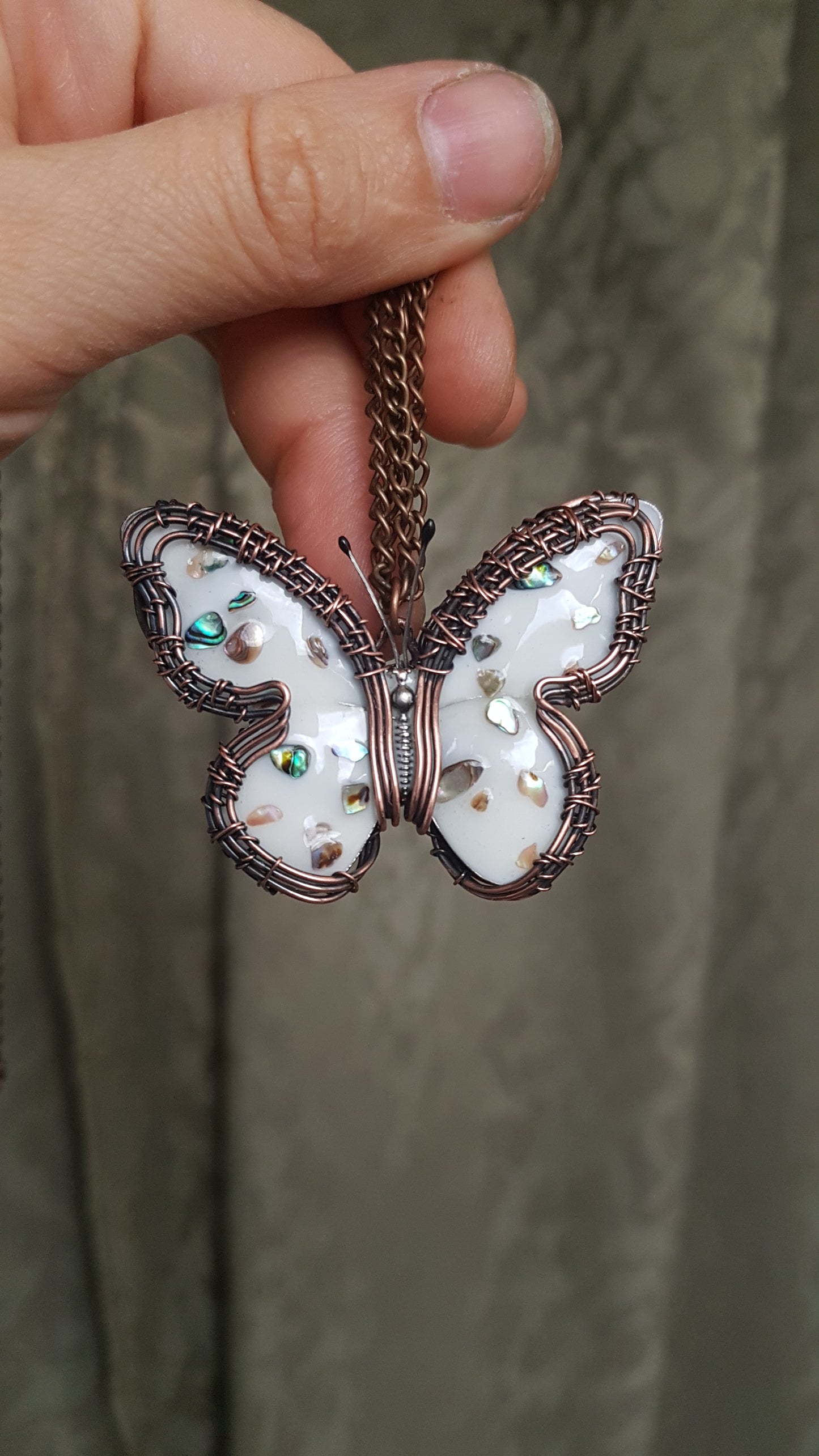 Reversible. White enamel butterfly necklace.