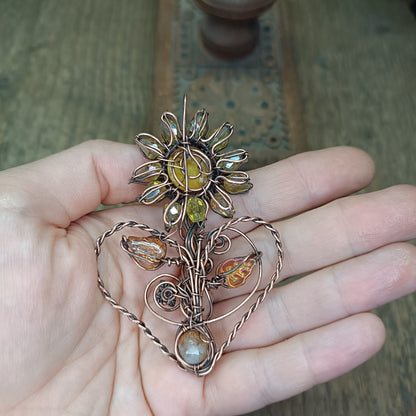 Sunflower pendant with citrine root.