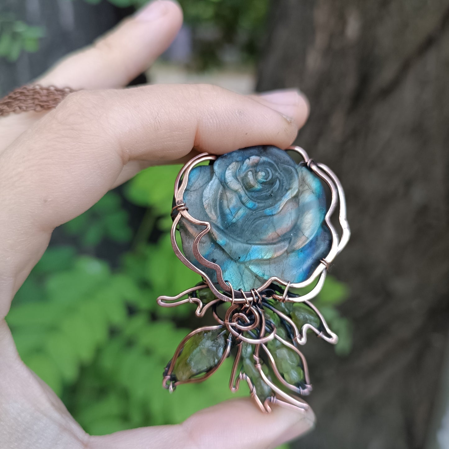 Glowing rose pendant