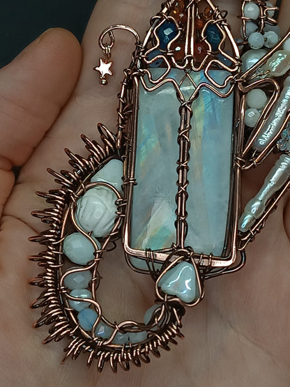 The ballad of the Pearl Dragon and the Moonstone Castle. Wire wrapped necklace