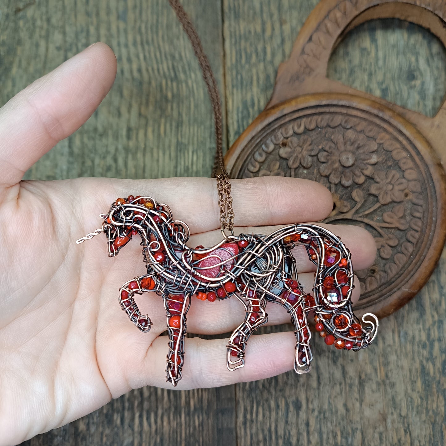 Red horse pendant.