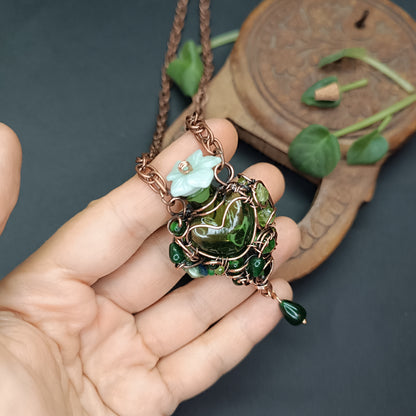 Green heart vial necklace