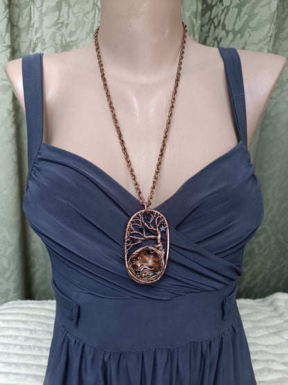 Mouse in the nest necklace.