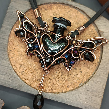 Black (with some purple) bat bottle necklace