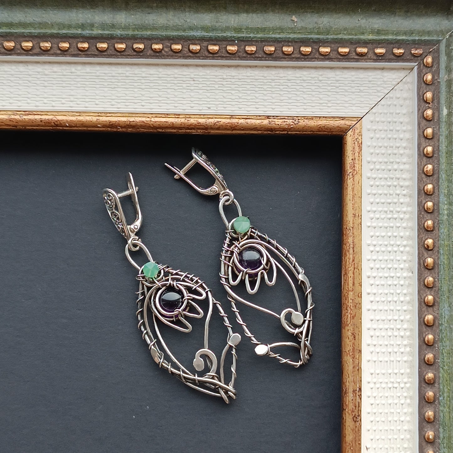 Silver dangling earrings. Amethyst bells.