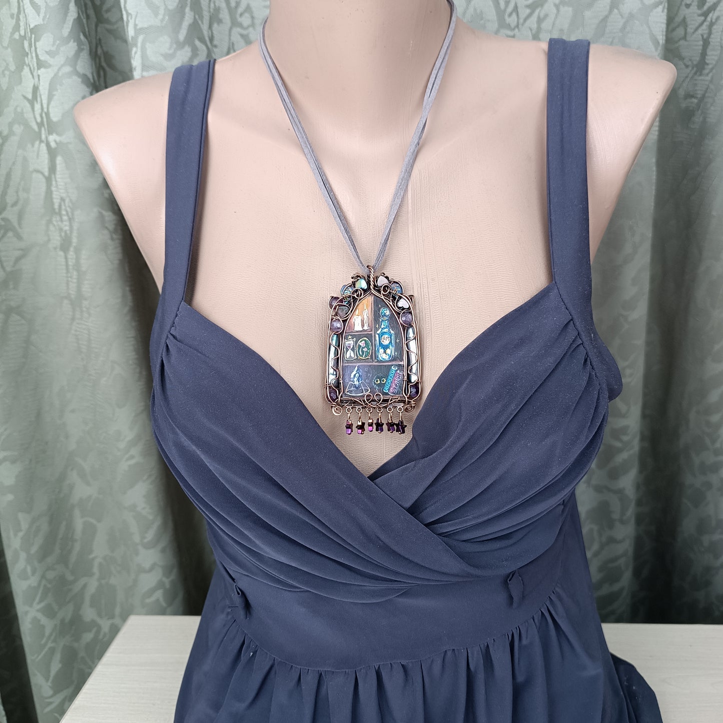 "Tiny magician". Wearable art necklace.