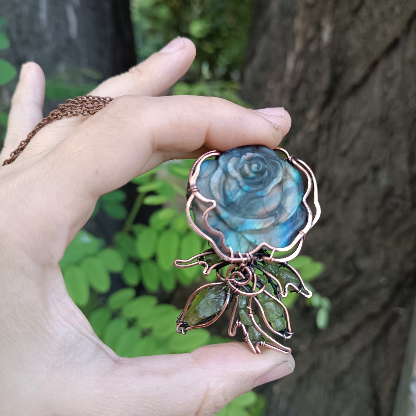 Glowing rose pendant