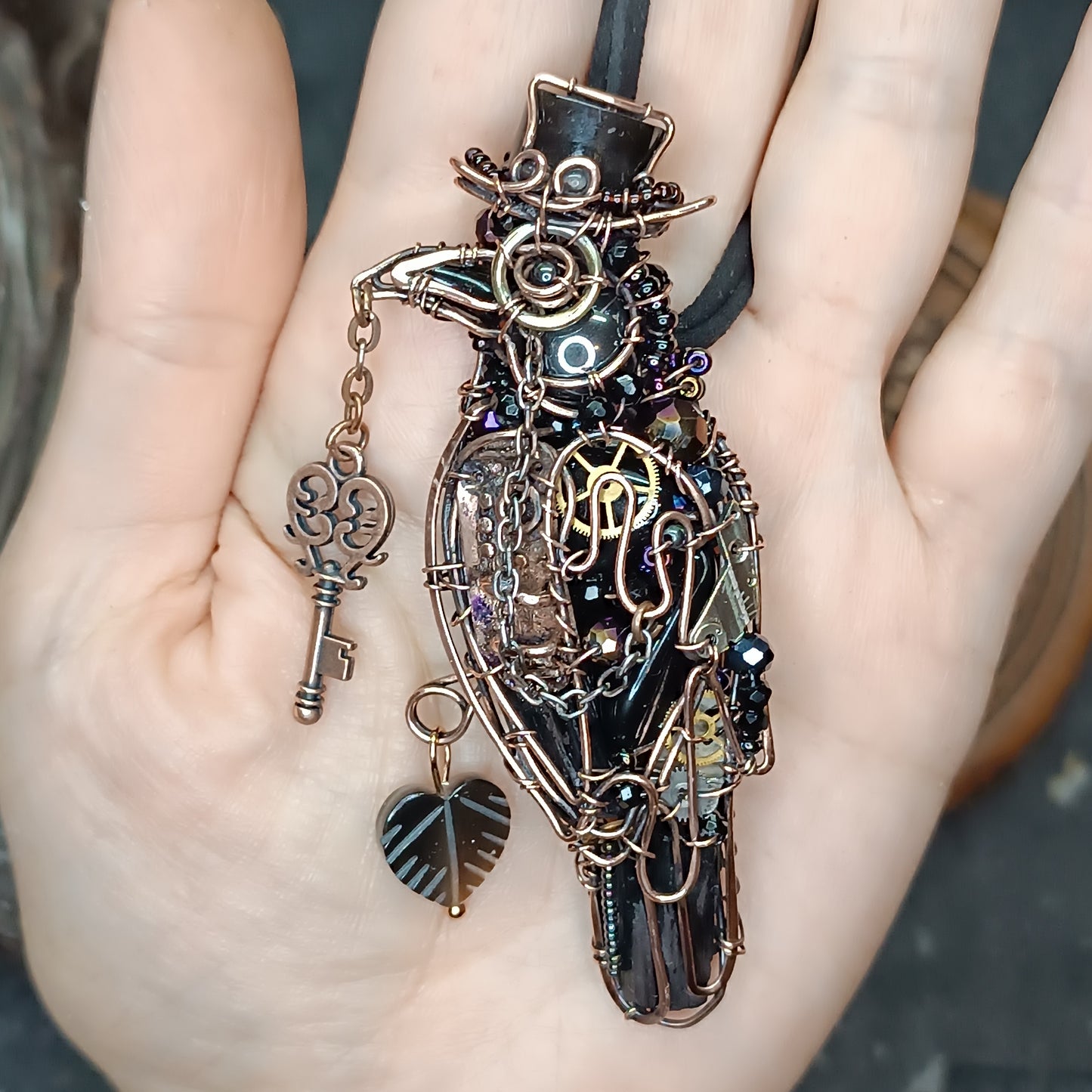 Steampunk raven necklace.