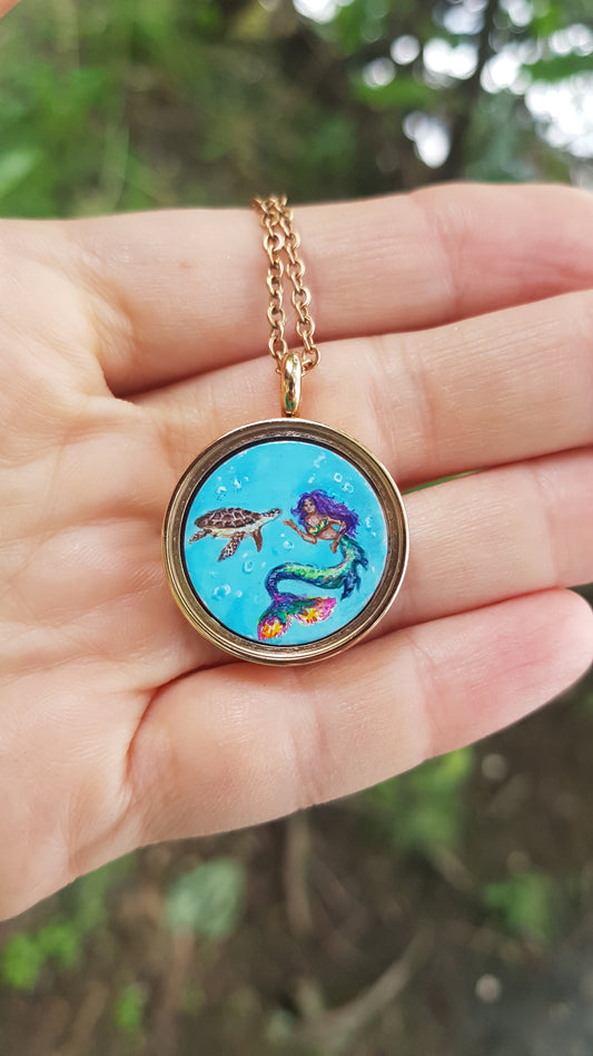 Mini reversible Mermaid and sea turtles pendant.