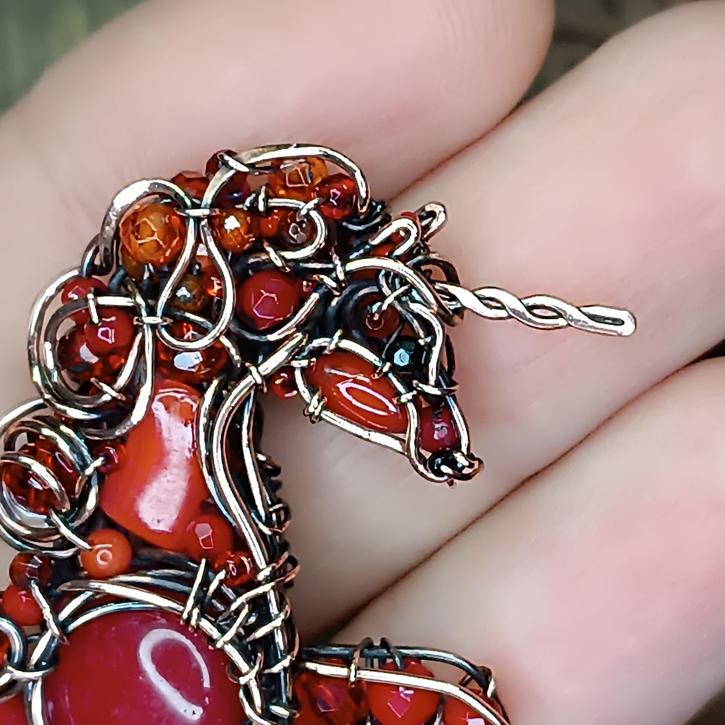 Red horse pendant.