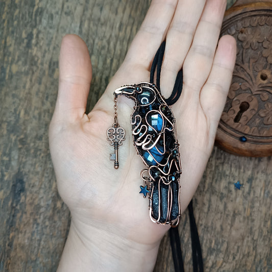 Secret keeper. Raven with the blue star. Wire wrapped necklace
