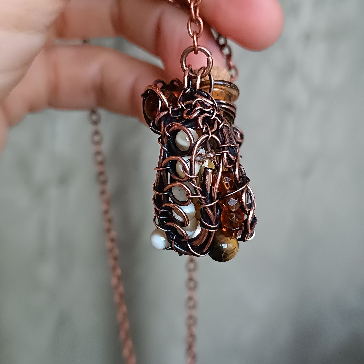 For Susan. Paw vial pendant