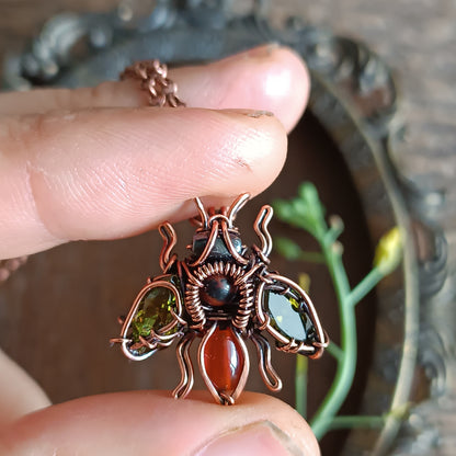 Green olive wings bee charm.