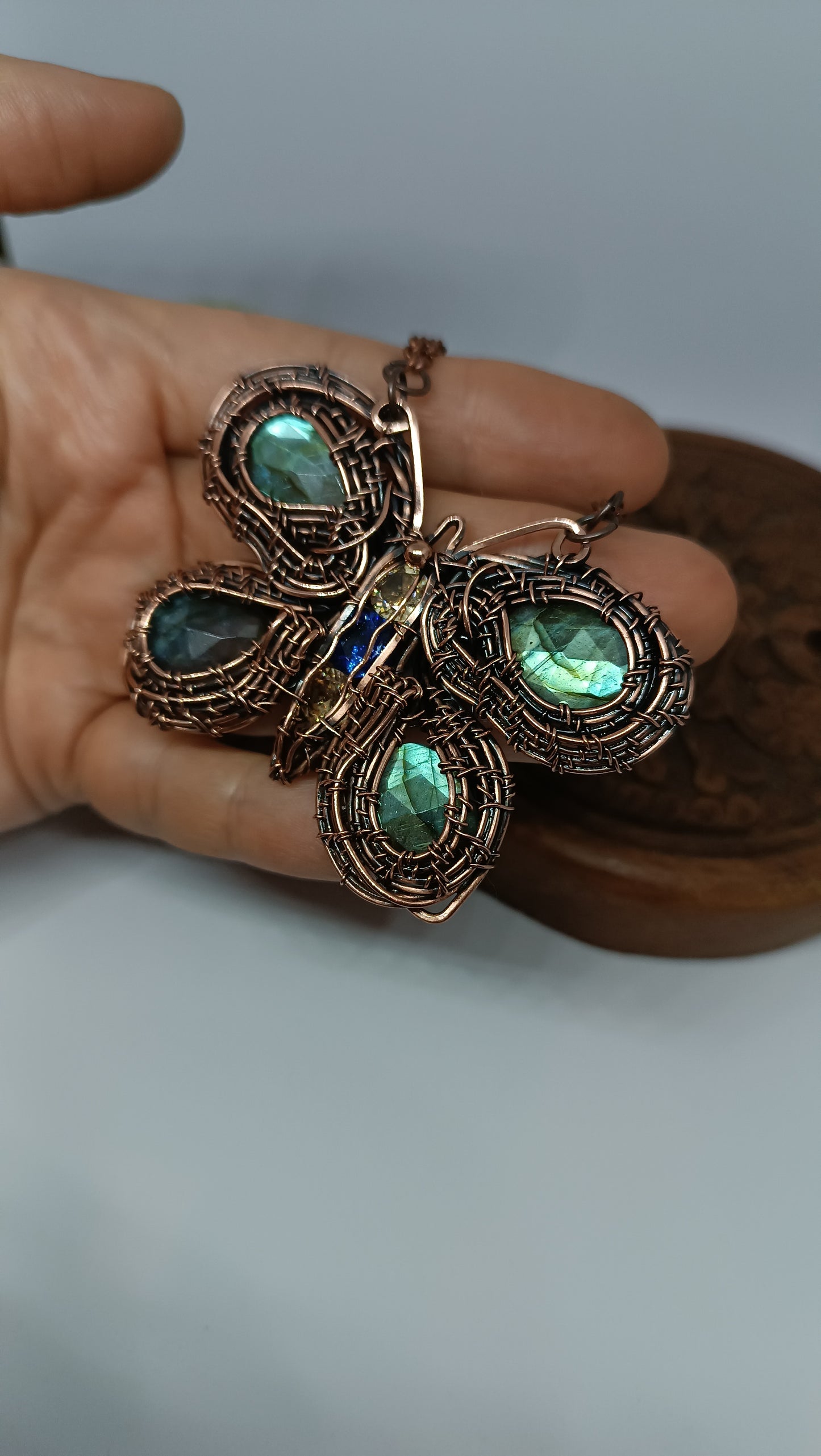 Copper wire wrapped butterfly necklace with faceted labradorites