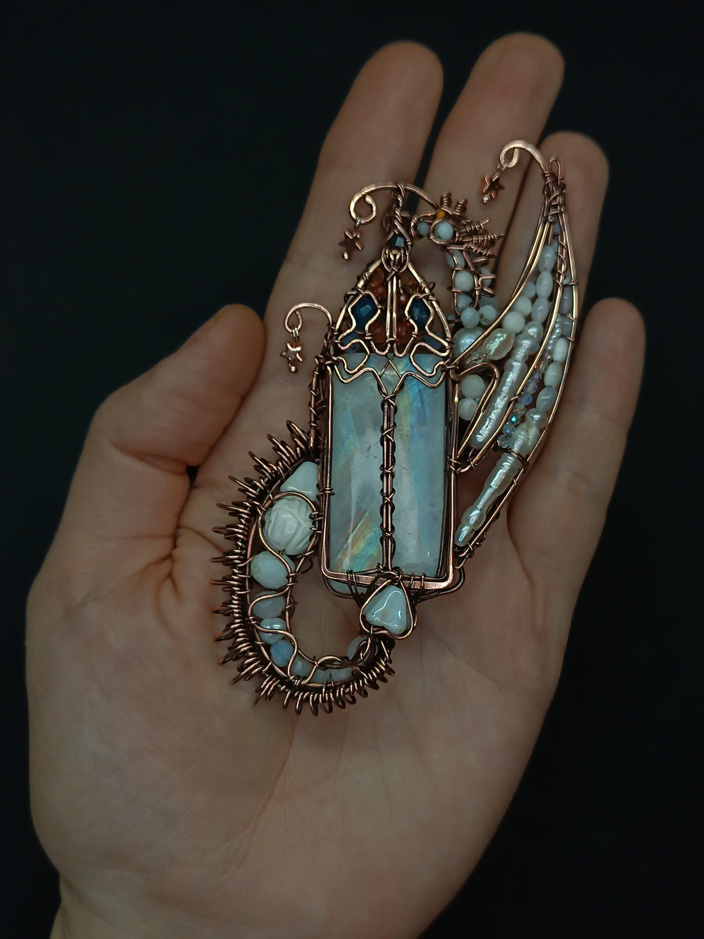 The ballad of the Pearl Dragon and the Moonstone Castle. Wire wrapped necklace