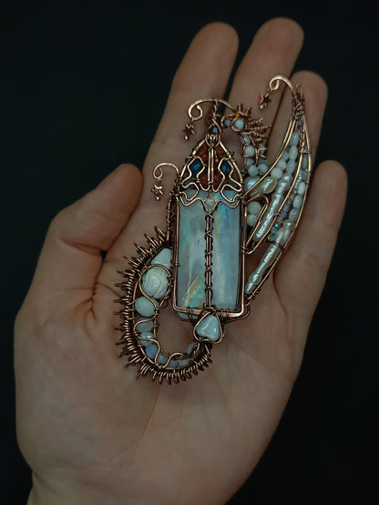 The ballad of the Pearl Dragon and the Moonstone Castle. Wire wrapped necklace