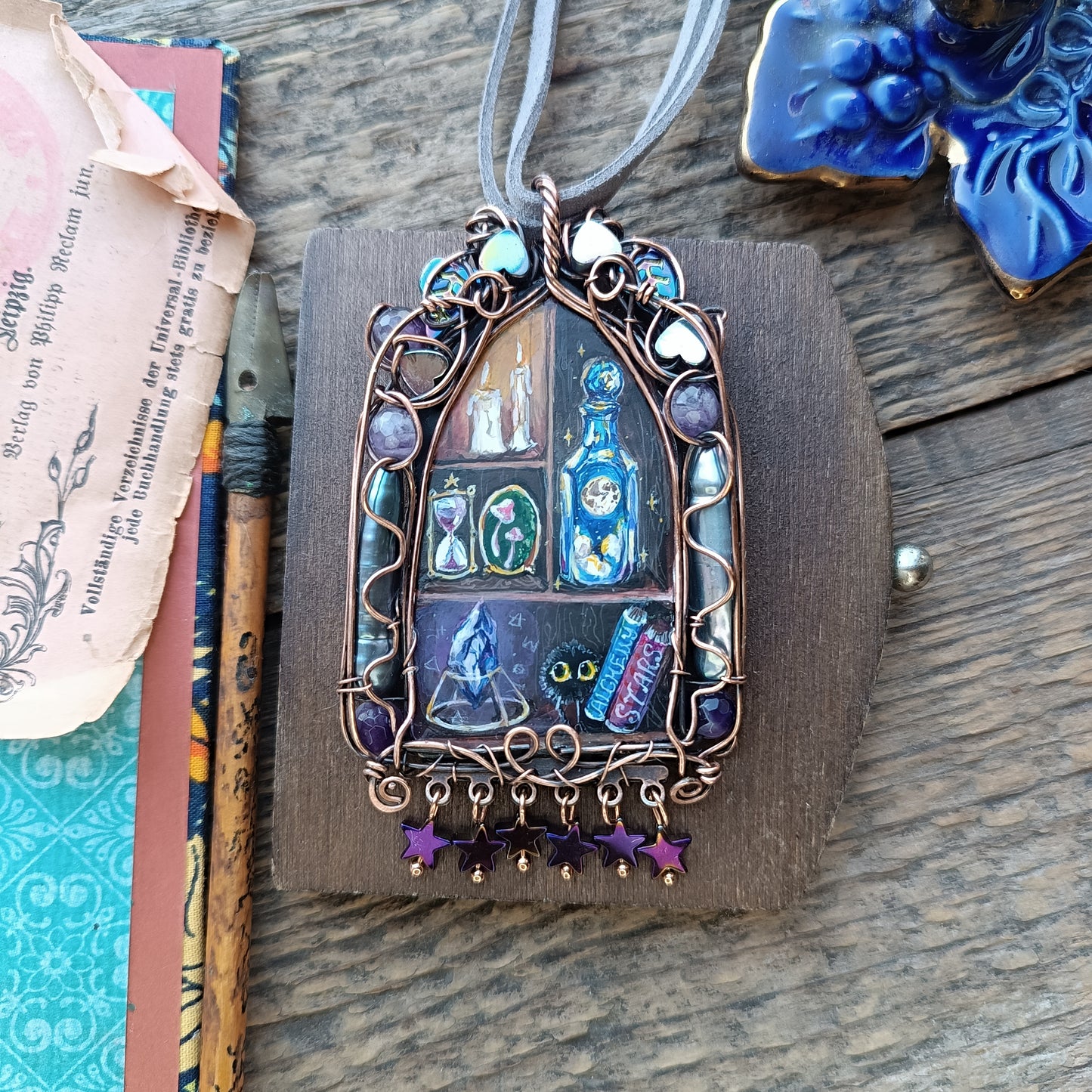 "Tiny magician". Wearable art necklace.
