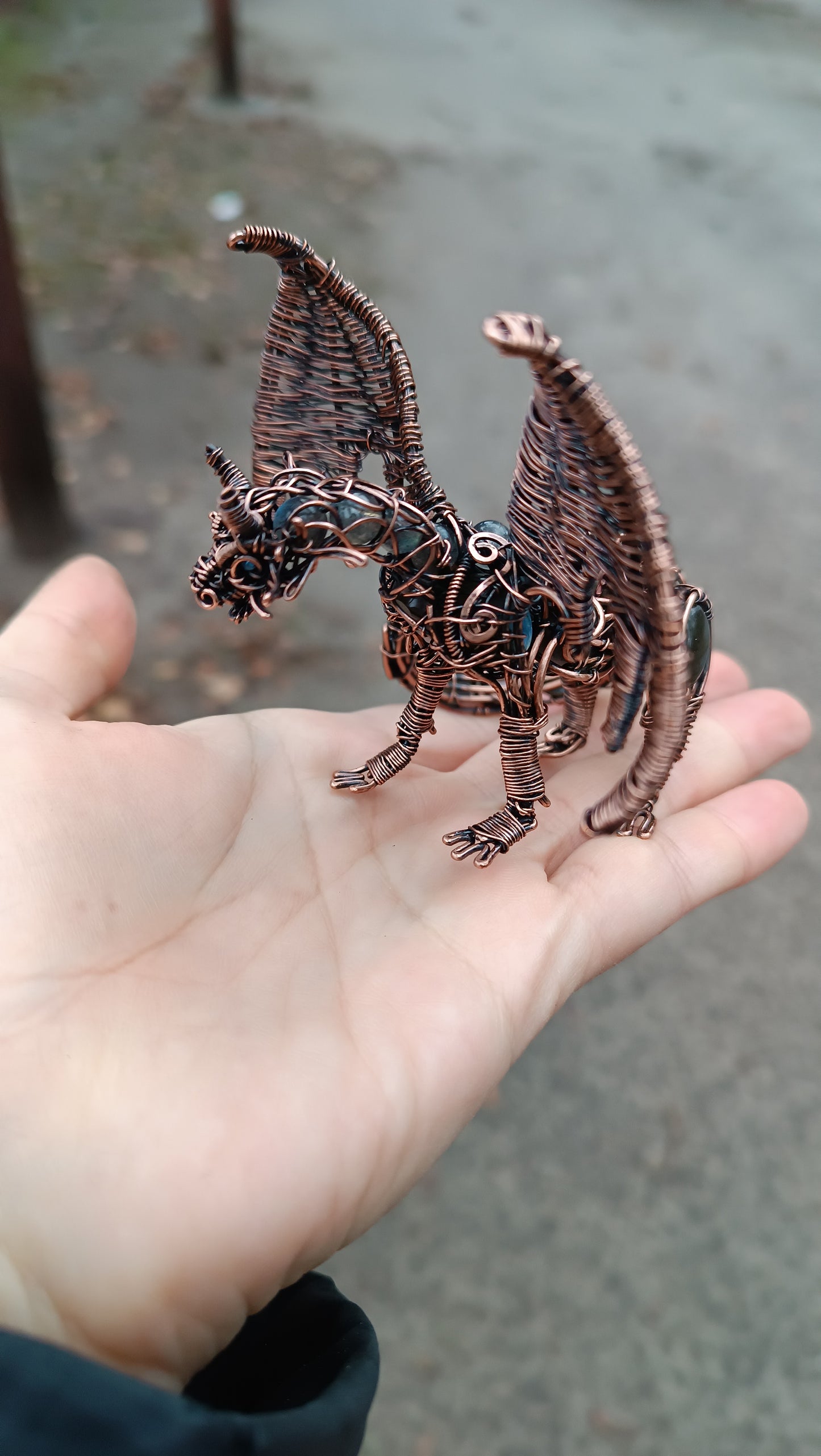 Dragon figurine with labradorites.