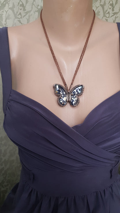 Reversible.Black enamel butterfly necklace.