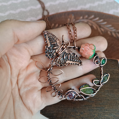 Life circle. Pink raspberry butterfly necklace