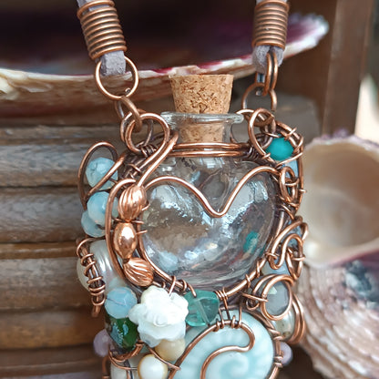Heart of the ocean. Reversible vial necklace