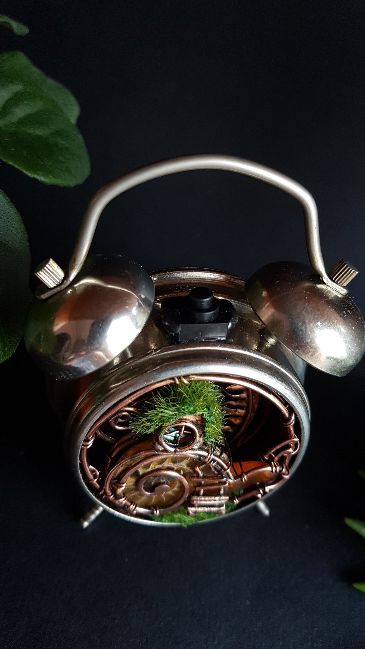 Snail fairy house. Mini world in a clock. Steampunk decor with light.