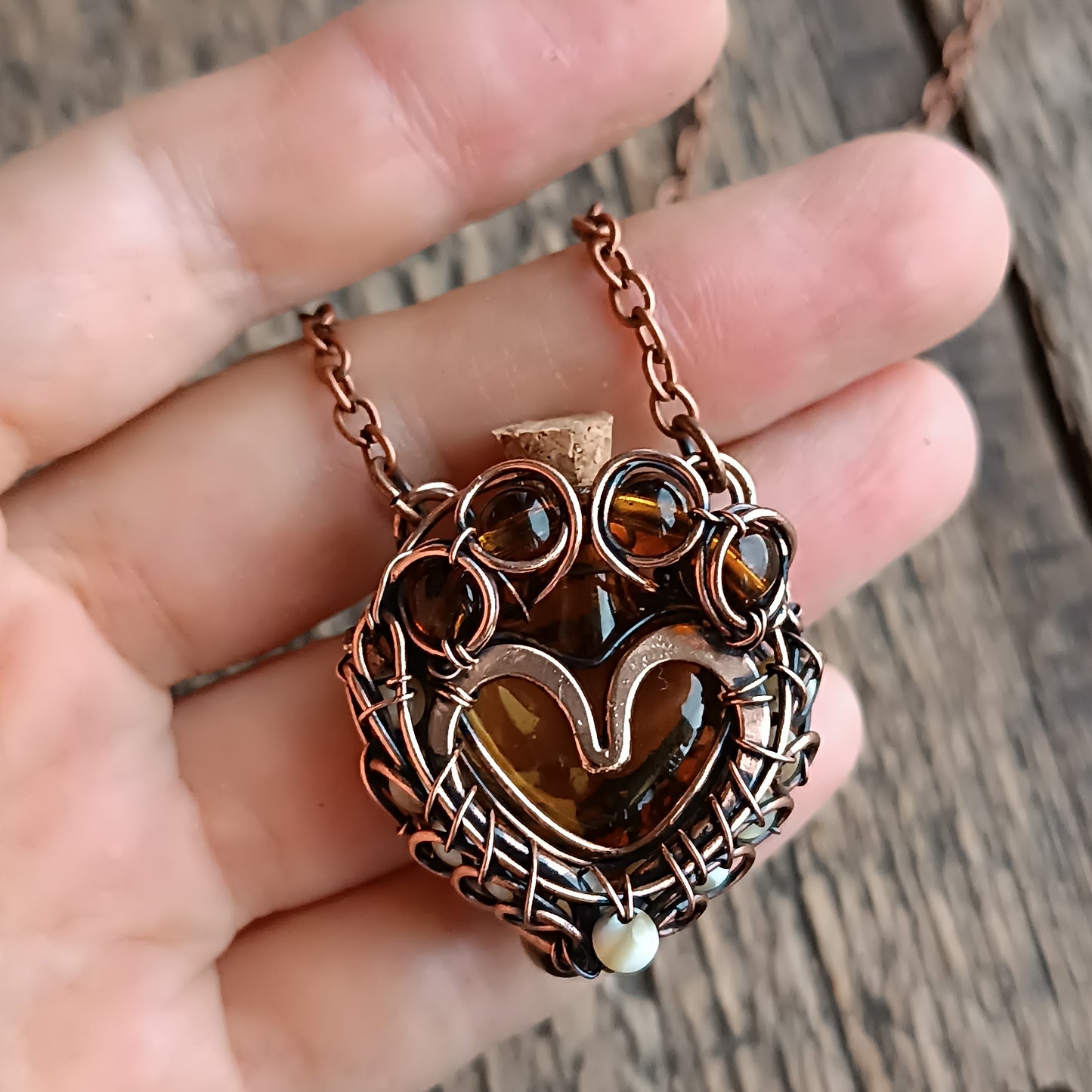 For Susan. Paw vial pendant