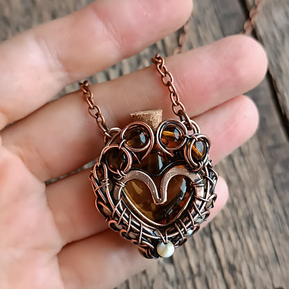 For Susan. Paw vial pendant