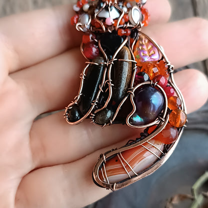 For Hanne. Red panda pendant