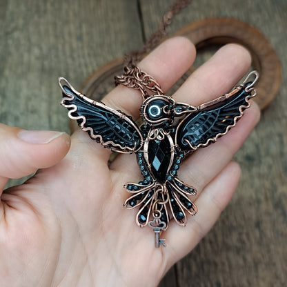 Secret keeper. Raven necklace with open wings.