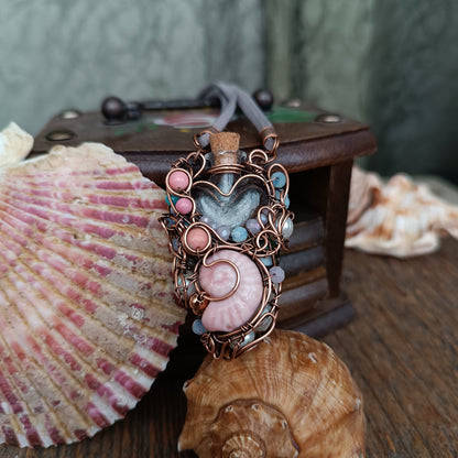 Heart of the ocean. Reversible vial necklace