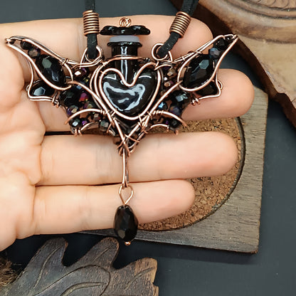 Black (with some purple) bat bottle necklace