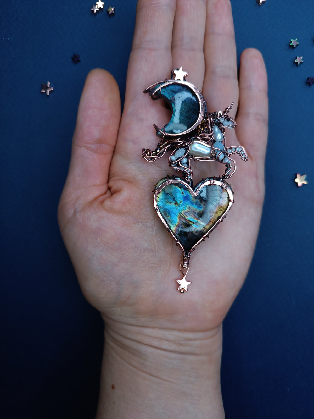 Space unicorn necklace.