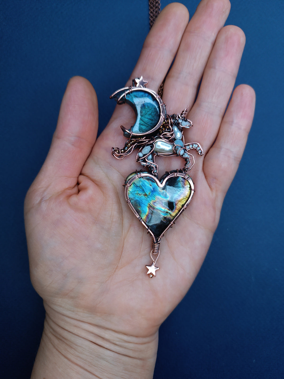 Space unicorn necklace.