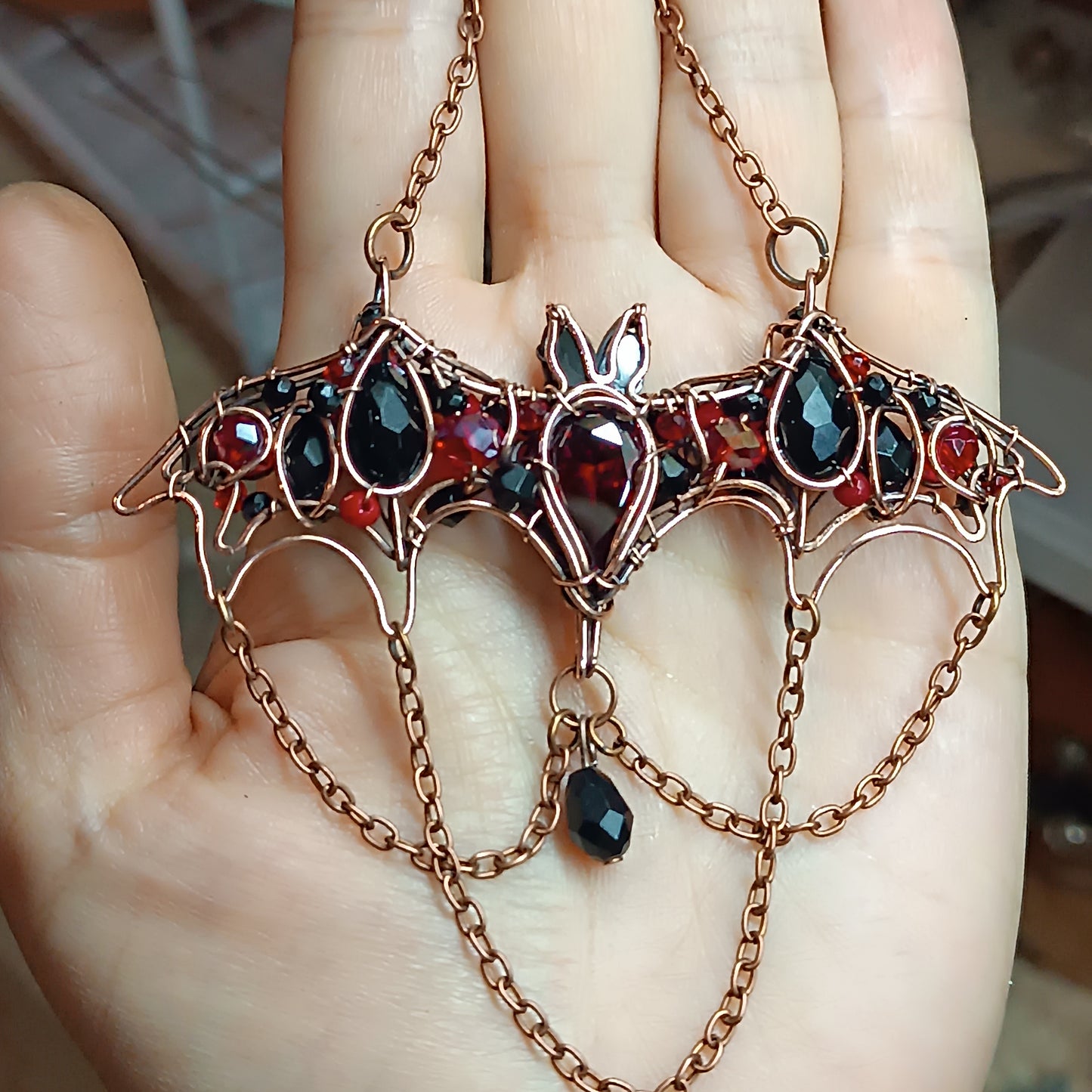 For Paige. Scarlett and black bat necklace