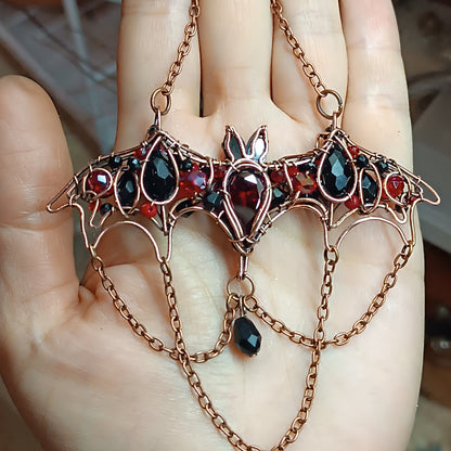For Paige. Scarlett and black bat necklace