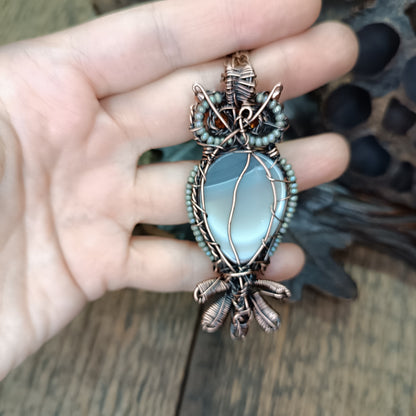 Owl necklace.