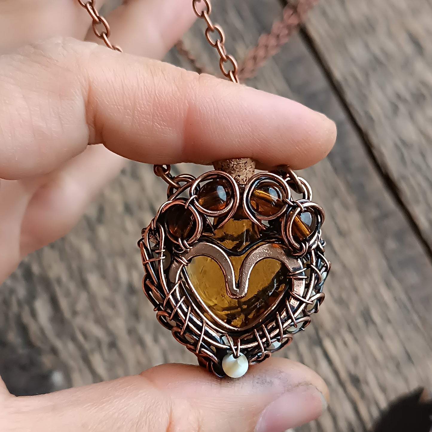 For Susan. Paw vial pendant