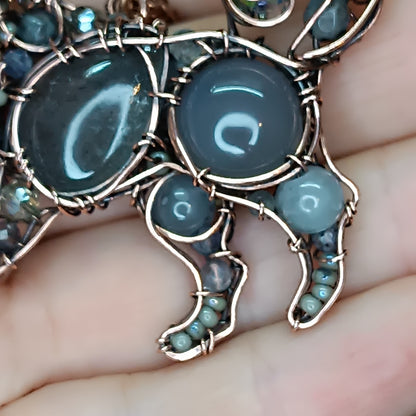 Sweet puppy. Detailed wire wrapped and beaded pendant.